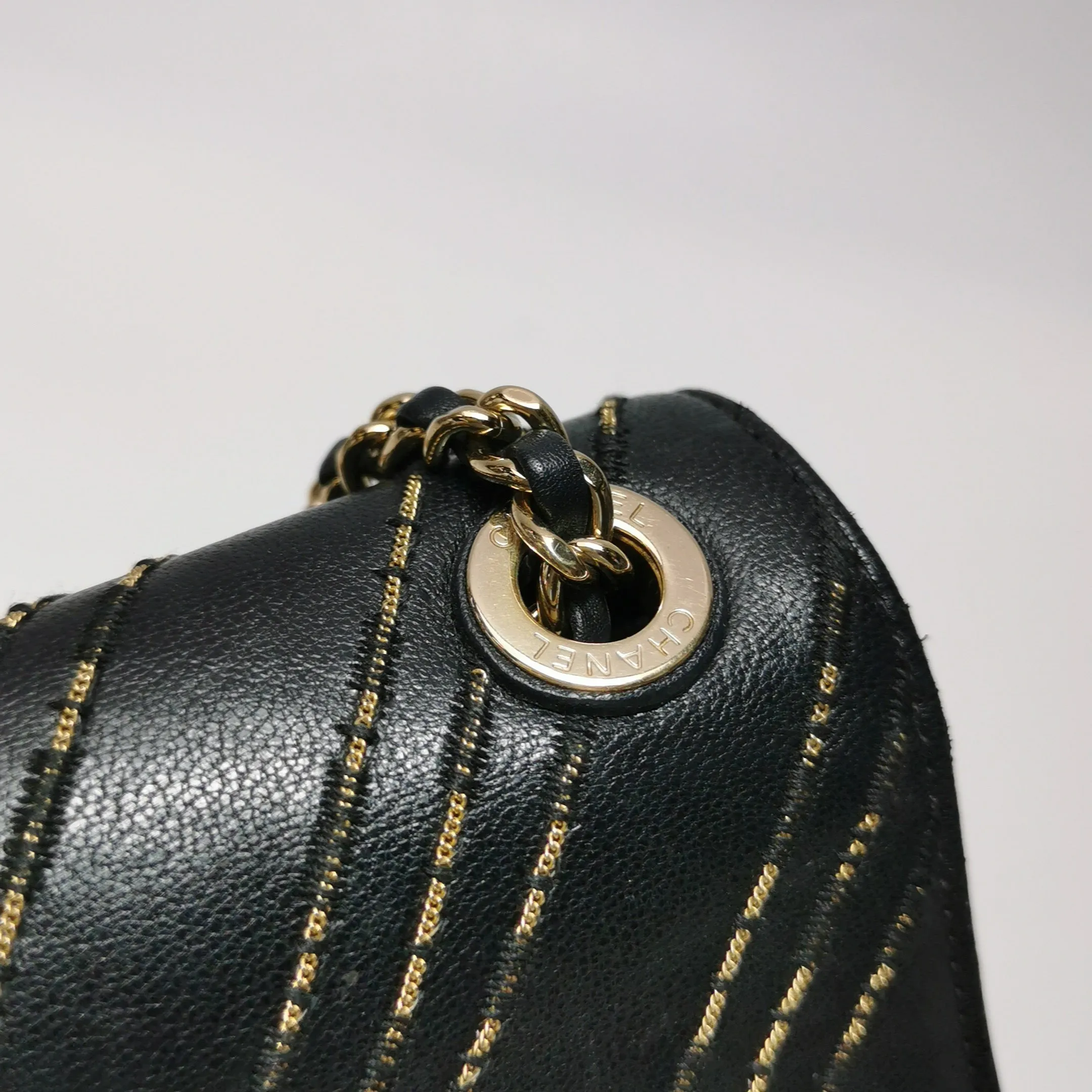 Chanel Chevron Subtle Flap Bag Black Gold Detail