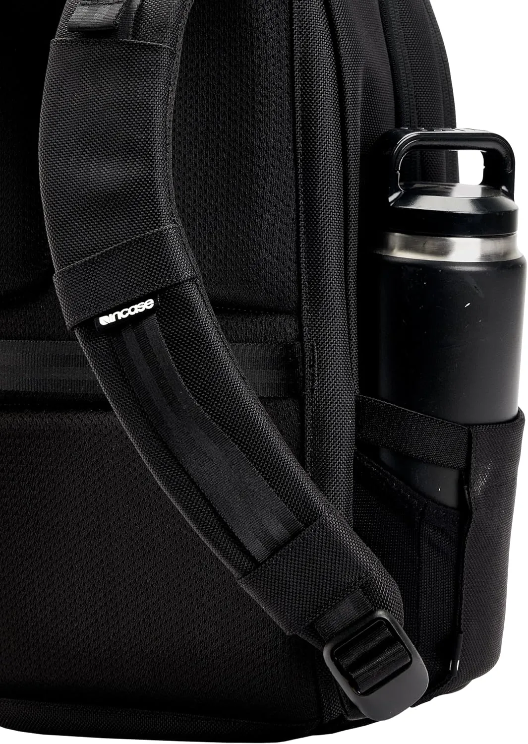Incase Tracks Backpack - Water Repellent Exterior, Padded Laptop Pocket, Dual Side Pockets, Luggage Pass Through (Black, 25L)